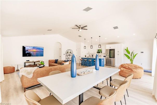 Dining room, Interior, Kitchen, Living room, Pendant Lights, Recessed Lighting, Stainless Steel Appliances, Wood Texture Flooring