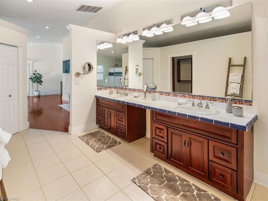 Bathroom, Dual Sink Vanities, Interior, Recessed Lighting, Tile Countertops
