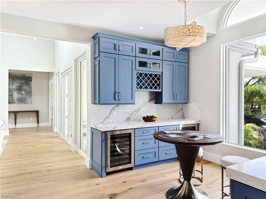 Interior, Marble Walls, Pendant Lights, Recessed Lighting, Wood Texture Flooring