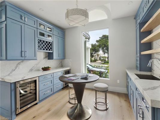 Interior, Kitchen, Marble Walls, Pendant Lights, Recessed Lighting, Wood Texture Flooring