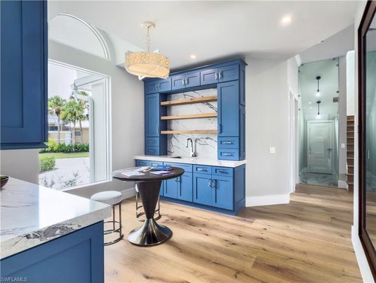 Interior, Kitchen, Marble Walls, Pendant Lights, Recessed Lighting, Wood Texture Flooring
