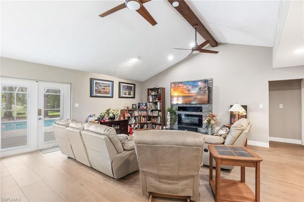 Fireplace, Interior, Living room, Recessed Lighting, Wooden Beams, Wood Texture Flooring