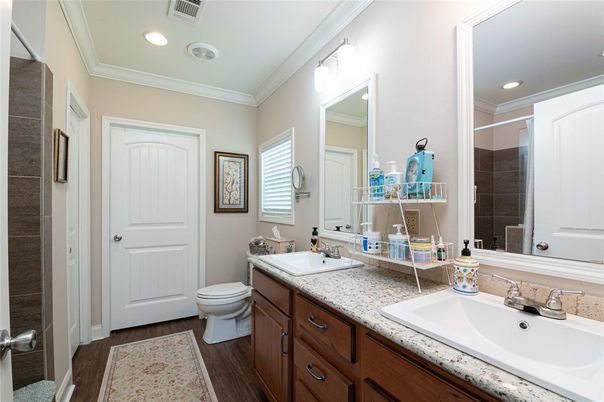 Bathroom, Dual Sink Vanities, Interior, Recessed Lighting, Wood Texture Flooring