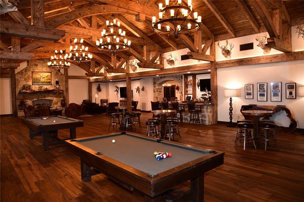 Billiard Table, Chandelier, Fireplace, Game Room, Interior, Stone Walls, Wooden Beams, Wooden Ceilings, Wood Texture Flooring