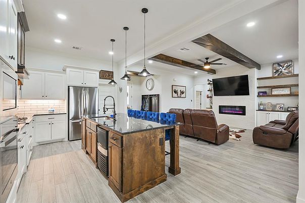Fireplace, Interior, Kitchen, Living room, Pendant Lights, Recessed Lighting, Stainless Steel Appliances, Wooden Beams, Wood Texture Flooring