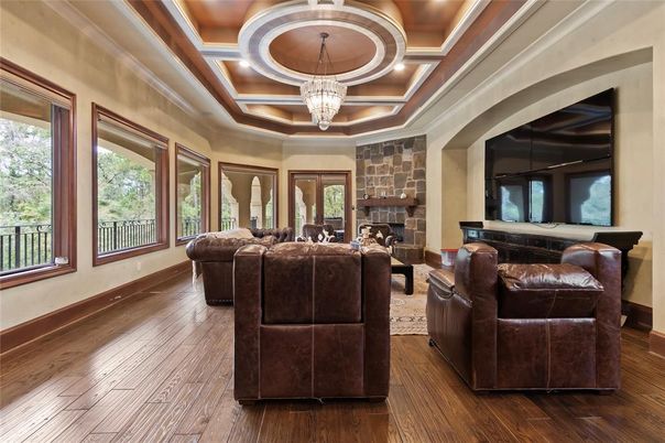 Chandelier, Fireplace, Interior, Living room, Recessed Lighting, Wooden Ceilings, Wood Texture Flooring
