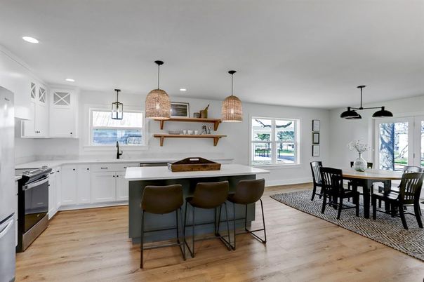 Dining room, Interior, Kitchen, Pendant Lights, Recessed Lighting, Stainless Steel Appliances, Wood Texture Flooring