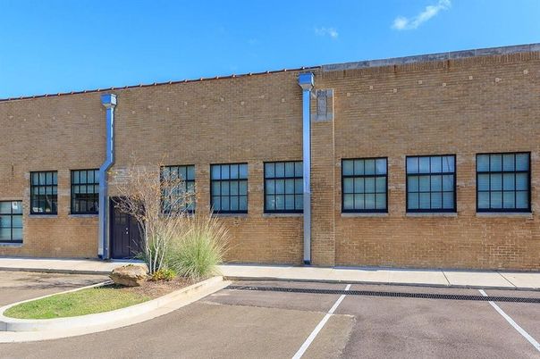 Exterior, Facade, Brick Facade, Condo Building