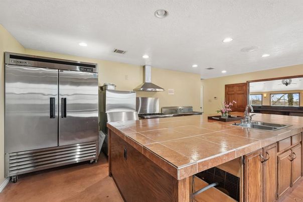 Interior, Kitchen, Recessed Lighting, Stainless Steel Appliances, Tile Countertops