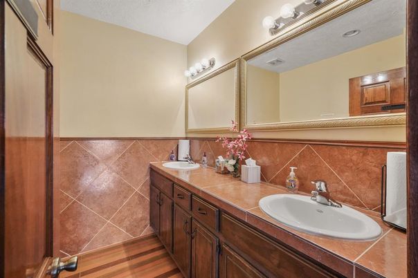 Bathroom, Dual Sink Vanities, Interior, Tile Countertops, Wood Texture Flooring
