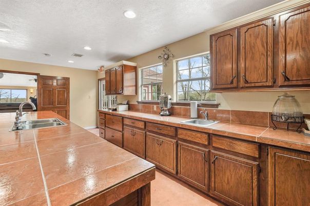 Interior, Kitchen, Recessed Lighting, Tile Countertops