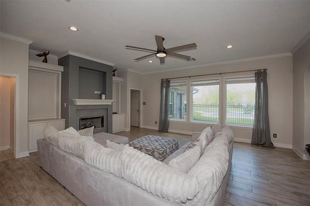 Fireplace, Interior, Living room, Recessed Lighting, Wood Texture Flooring