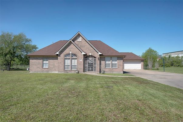 Attached, Backyard, Exterior, Facade, Brick Facade, Brick Traditional