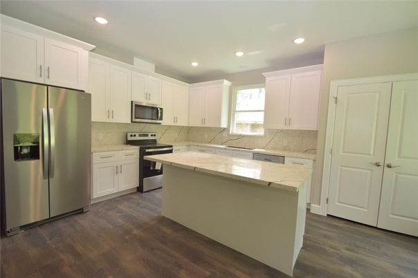 Interior, Kitchen, Recessed Lighting, Stainless Steel Appliances, Wood Texture Flooring