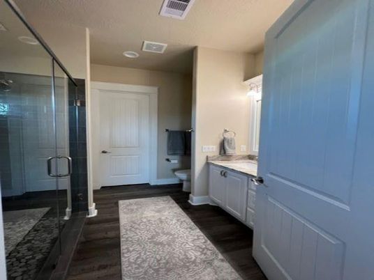 Bathroom, Glass Shower, Interior, Recessed Lighting, Wood Texture Flooring