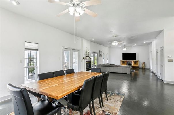 Dining room, Fireplace, Interior, Living room, Recessed Lighting, Wood Texture Flooring