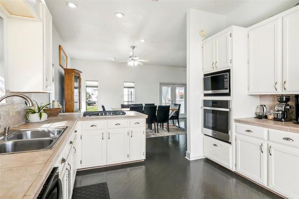Dining room, Interior, Kitchen, Recessed Lighting, Tile Countertops, Wood Texture Flooring