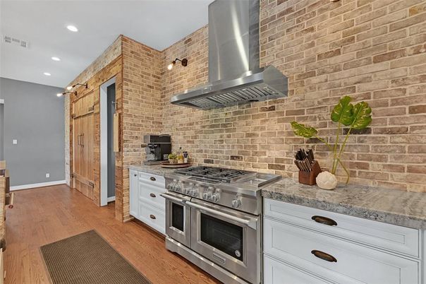 Interior, Kitchen, Recessed Lighting, Stainless Steel Appliances, Stone Walls, Wood Texture Flooring