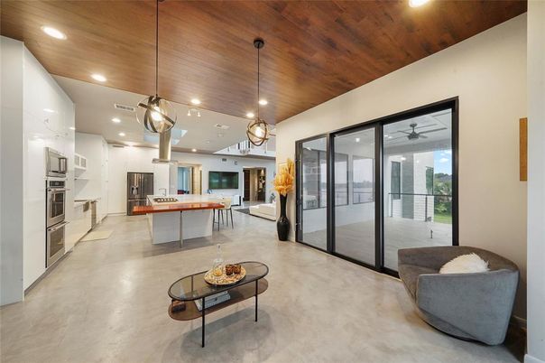 Fireplace, Interior, Kitchen, Pendant Lights, Recessed Lighting, Stainless Steel Appliances, Wooden Ceilings