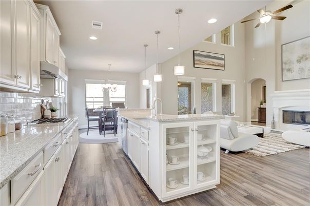 Chandelier, Dining room, Fireplace, Interior, Kitchen, Living room, Pendant Lights, Recessed Lighting, Wood Texture Flooring