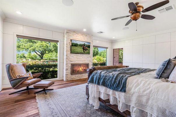 Bedroom, Fireplace, Interior, Recessed Lighting, Stone Walls, Wood Texture Flooring