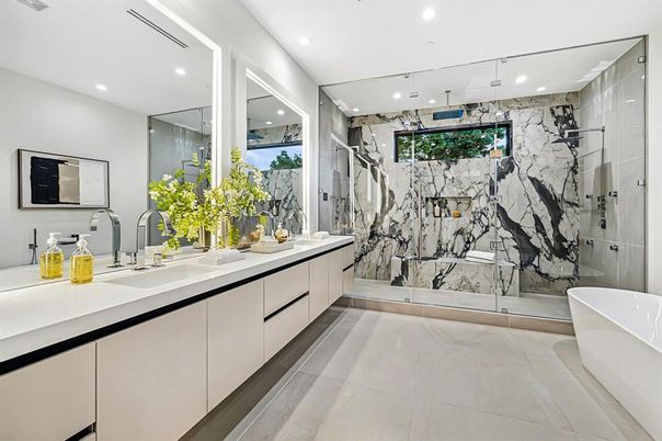 Bathroom, Dual Sink Vanities, Free Standing Baths, Glass Shower, Interior, Marble Walls, Recessed Lighting