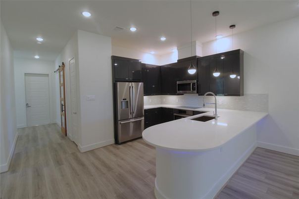 Interior, Kitchen, Pendant Lights, Recessed Lighting, Stainless Steel Appliances, Wood Texture Flooring