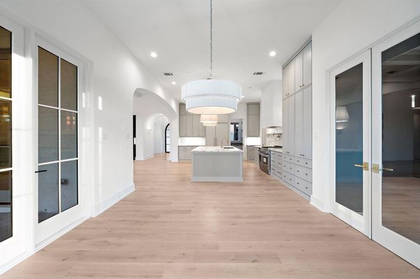 Chandelier, Interior, Kitchen, Pendant Lights, Recessed Lighting, Stainless Steel Appliances, Wood Texture Flooring
