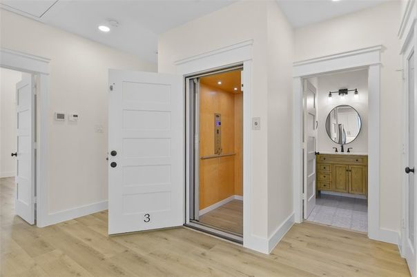 Elevator, Interior, Recessed Lighting, Wood Texture Flooring