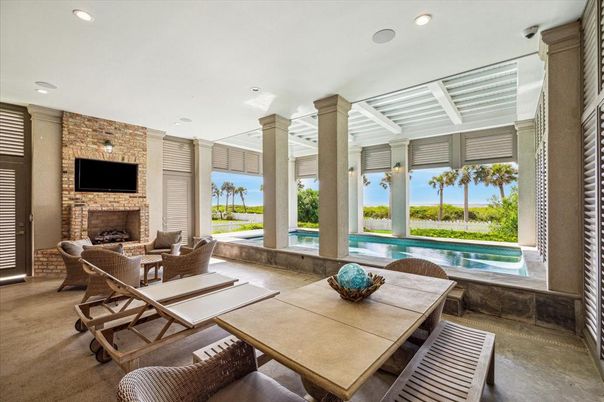 Dining room, Fireplace, Interior, Living room, Pool, Recessed Lighting, Stone Walls