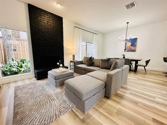 Dining room, Interior, Living room, Pendant Lights, Recessed Lighting, Stone Walls, Wood Texture Flooring