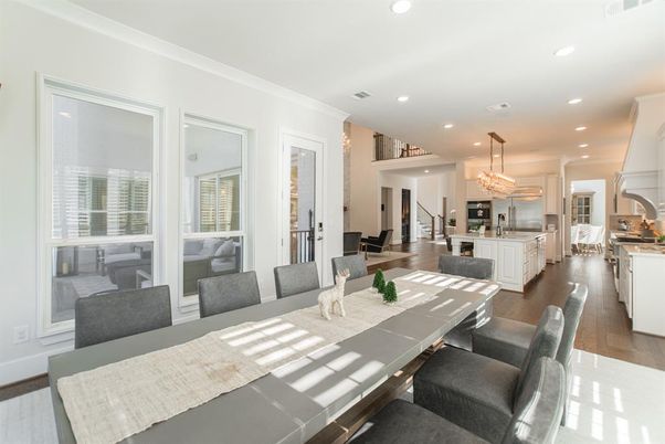 Chandelier, Dining room, Interior, Kitchen, Recessed Lighting, Stainless Steel Appliances, Wood Texture Flooring