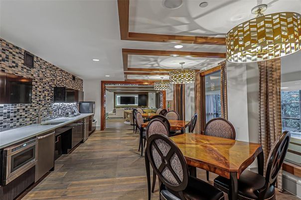 Dining room, Interior, Kitchen, Pendant Lights, Recessed Lighting, Stainless Steel Appliances, Wood Texture Flooring