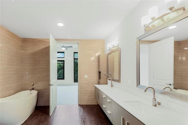 Bathroom, Dual Sink Vanities, Free Standing Baths, Interior, Recessed Lighting, Wood Texture Flooring