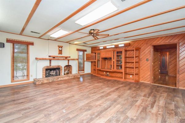 Empty room, Fireplace, Interior, Recessed Lighting, Wood Texture Flooring, Wooden Walls