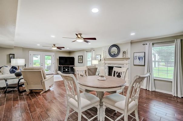 Dining room, Fireplace, Interior, Living room, Recessed Lighting, Wood Texture Flooring