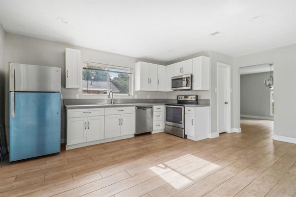 Interior, Kitchen, Recessed Lighting, Stainless Steel Appliances, Wood Texture Flooring