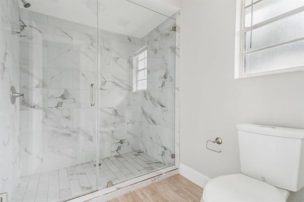 Bathroom, Glass Shower, Interior, Marble Walls, Wood Texture Flooring