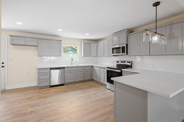 Interior, Kitchen, Pendant Lights, Recessed Lighting, Stainless Steel Appliances, Wood Texture Flooring
