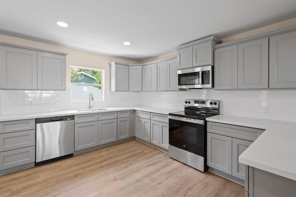 Interior, Kitchen, Recessed Lighting, Stainless Steel Appliances, Wood Texture Flooring
