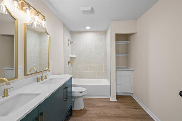 Bathroom, Dual Sink Vanities, Interior, Recessed Lighting, Wood Texture Flooring