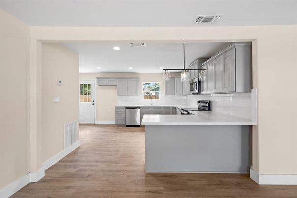 Interior, Kitchen, Pendant Lights, Recessed Lighting, Stainless Steel Appliances, Wood Texture Flooring