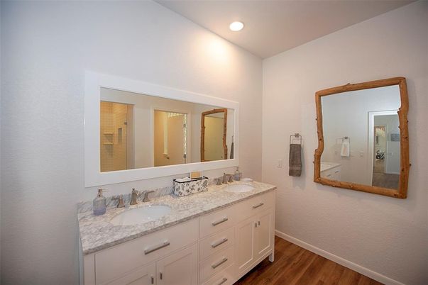 Bathroom, Dual Sink Vanities, Interior, Recessed Lighting, Wood Texture Flooring