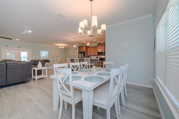 Chandelier, Dining room, Interior, Kitchen, Living room, Pendant Lights, Recessed Lighting, Wood Texture Flooring