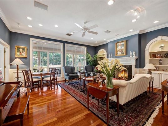 Dining room, Fireplace, Interior, Living room, Piano, Recessed Lighting, Wood Texture Flooring