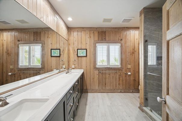 Bathroom, Dual Sink Vanities, Glass Shower, Interior, Recessed Lighting, Wood Texture Flooring, Wooden Walls