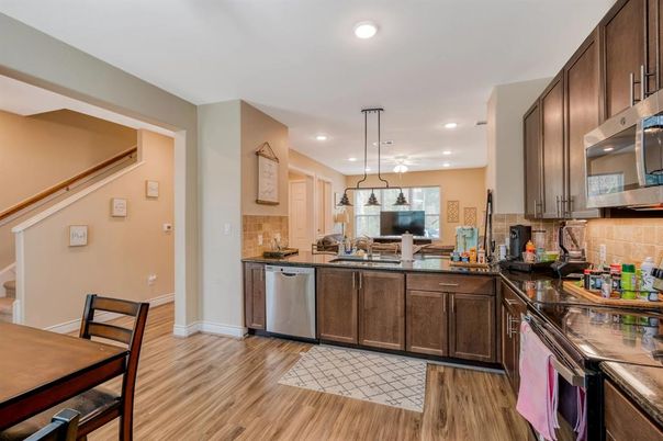 Interior, Kitchen, Pendant Lights, Recessed Lighting, Stainless Steel Appliances, Wood Texture Flooring