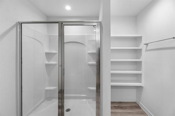 Bathroom, Glass Shower, Interior, Recessed Lighting, Walk-in Closets, Wood Texture Flooring