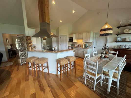 Dining room, Interior, Kitchen, Pendant Lights, Recessed Lighting, Stainless Steel Appliances, Wooden Beams, Wood Texture Flooring