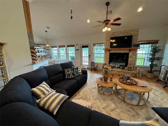 Dining room, Fireplace, Interior, Living room, Pendant Lights, Recessed Lighting, Stone Walls, Wood Texture Flooring